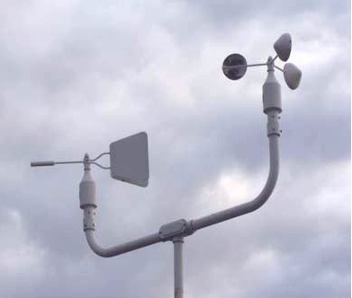 A wind vane and rotating cup anemometer.